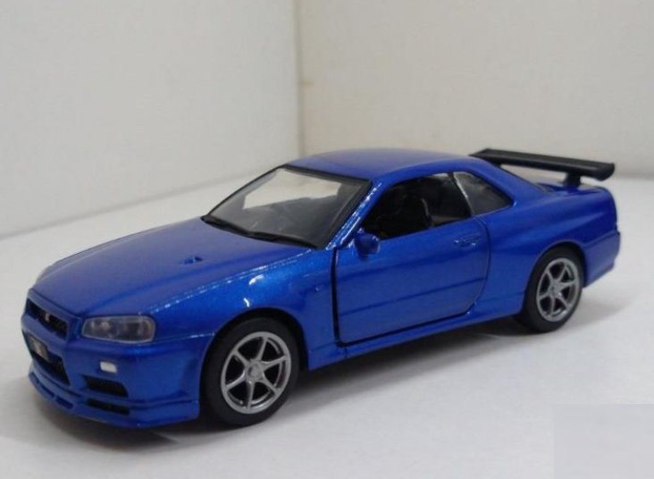 Miniatura Velozes e Furiosos Nissan Skyline GTR R34 escala 1:36